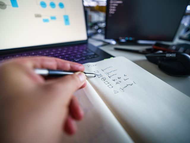 Notebook with keyword research notes