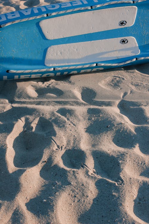 Free Surfboard on the Sand Stock Photo