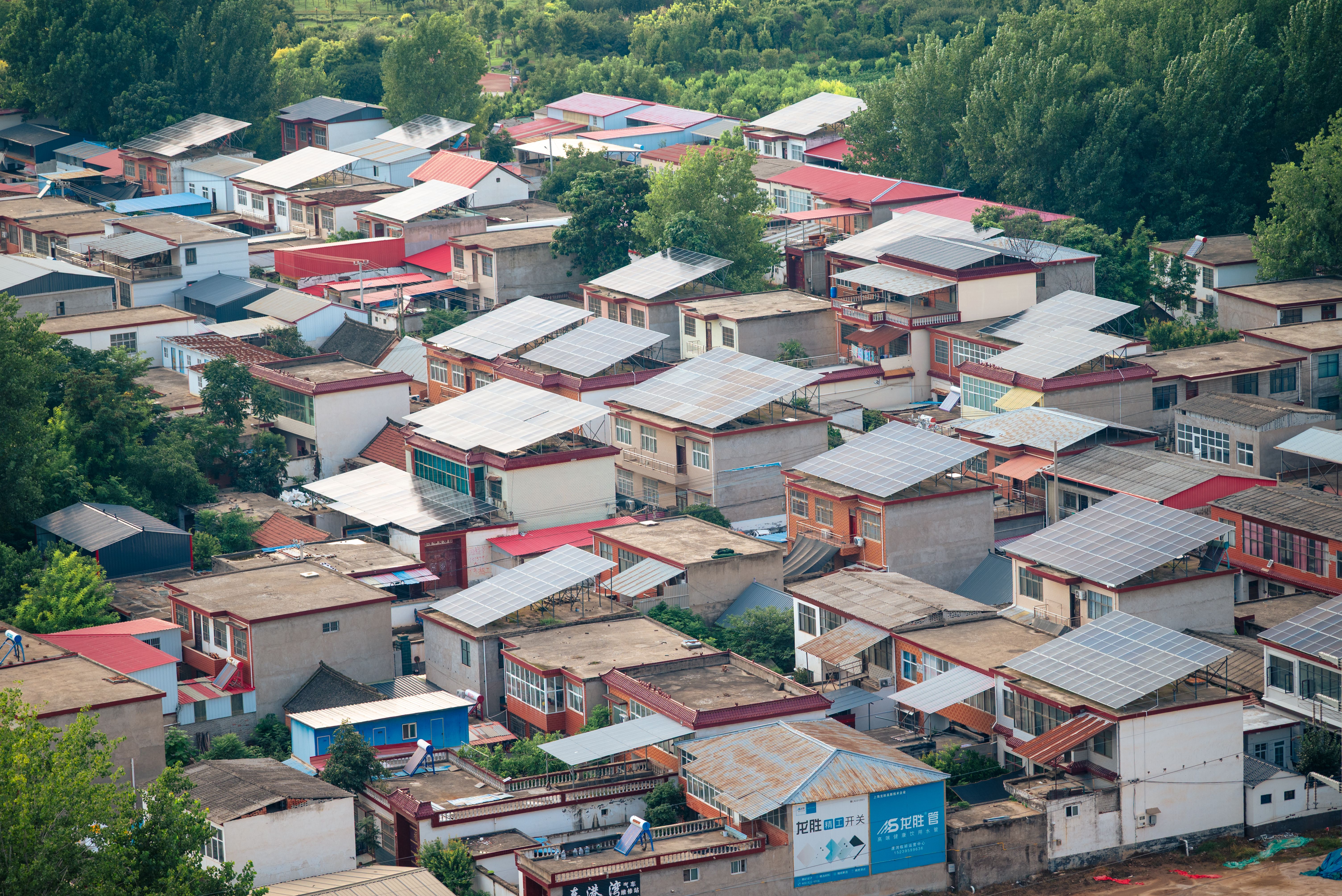 Residential solar panels on rooftops of homes in Raipur