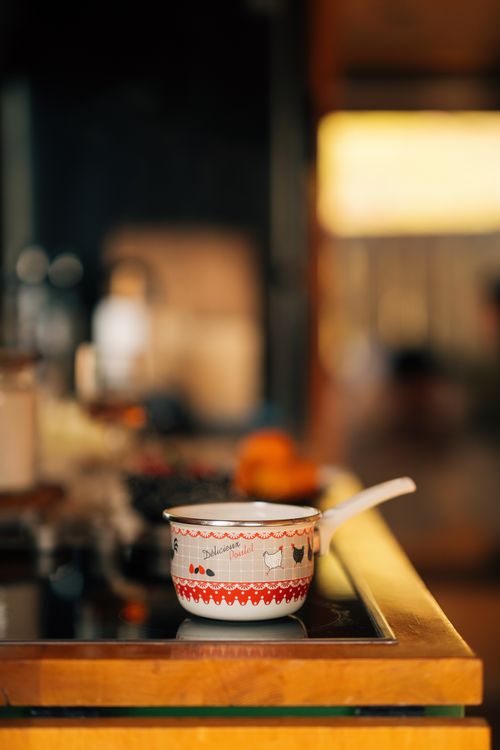 Free A cozy kitchen interior in Antalya with a decorative pot on the stove, evoking warmth. Stock Photo