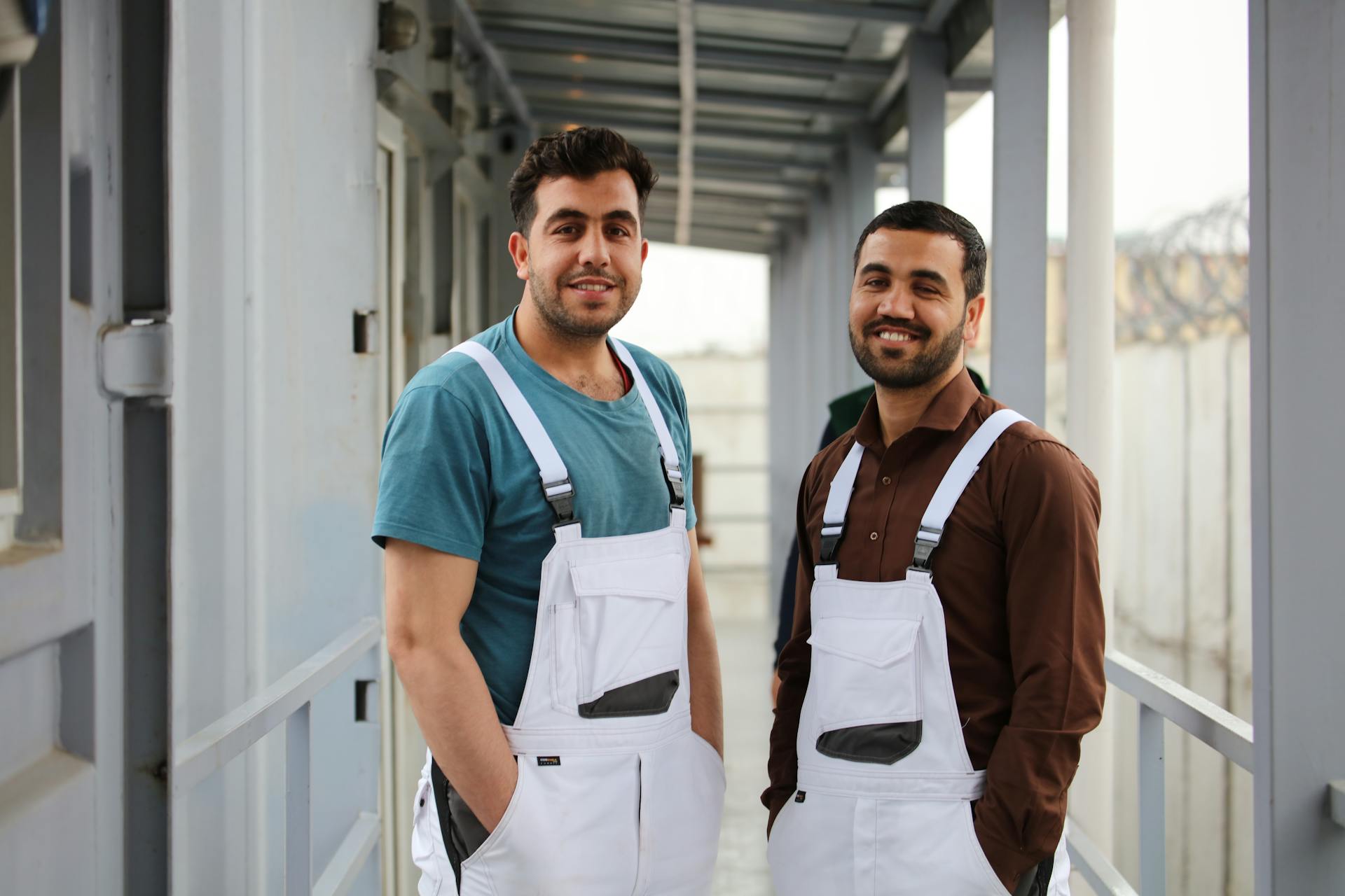 Men In White Dungarees