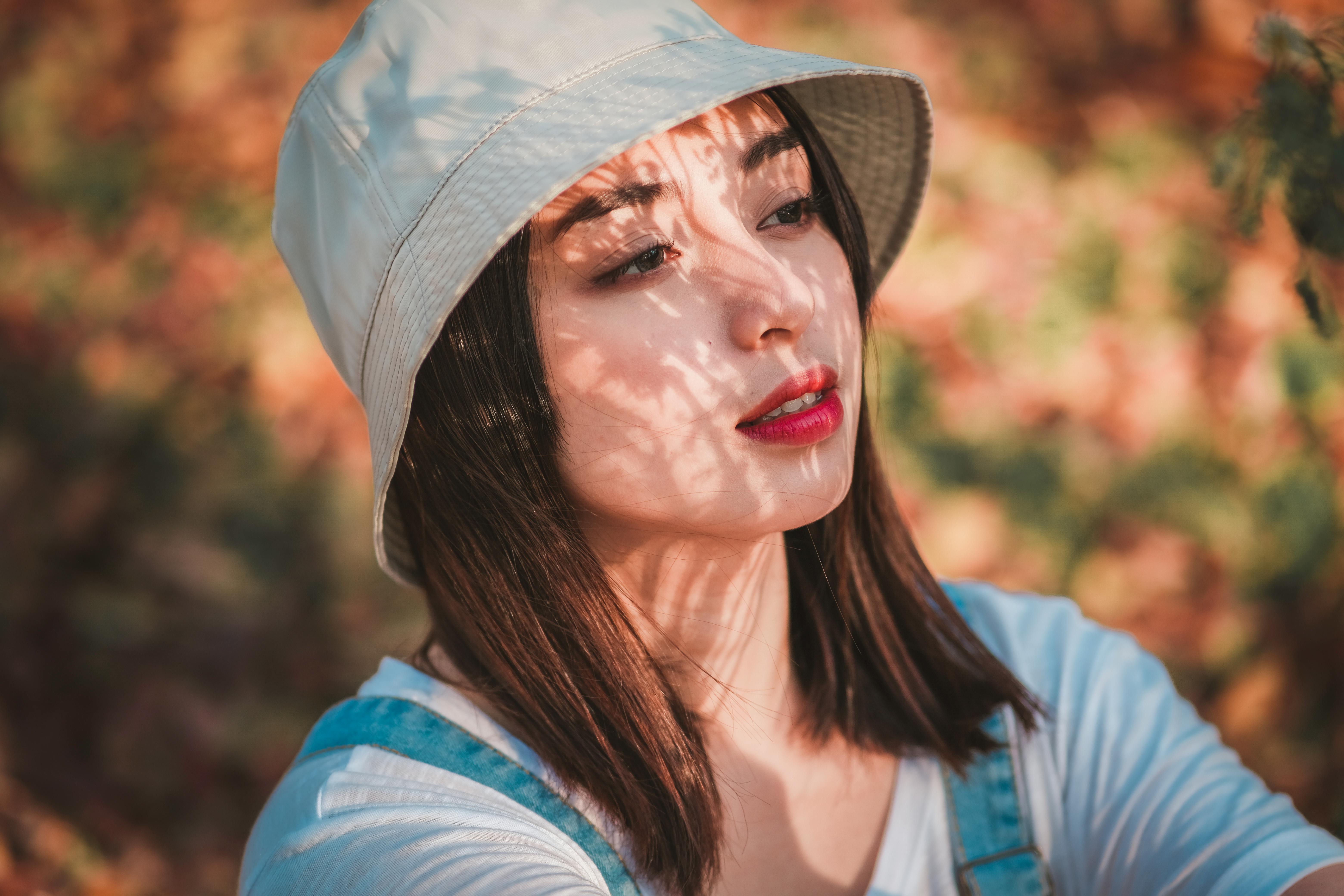 Woman Wearing Bucket Hat · Free Stock Photo