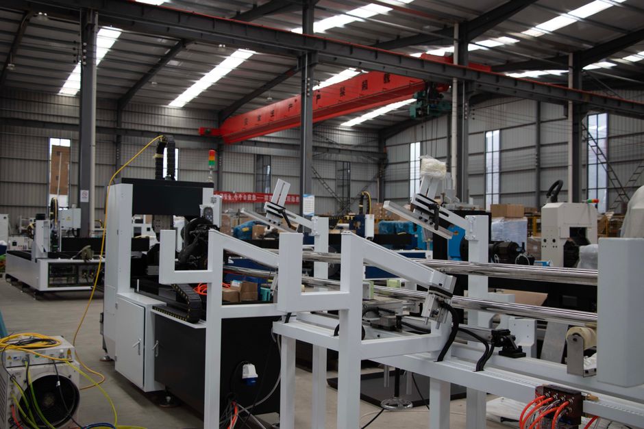Interior view of a modern industrial manufacturing facility with machinery and equipment.