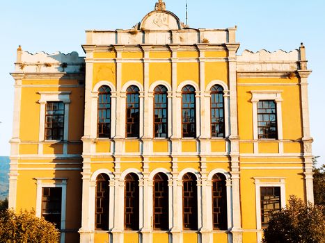 Elegant yellow historic building facade with classic architecture in Karabük, Türkiye.