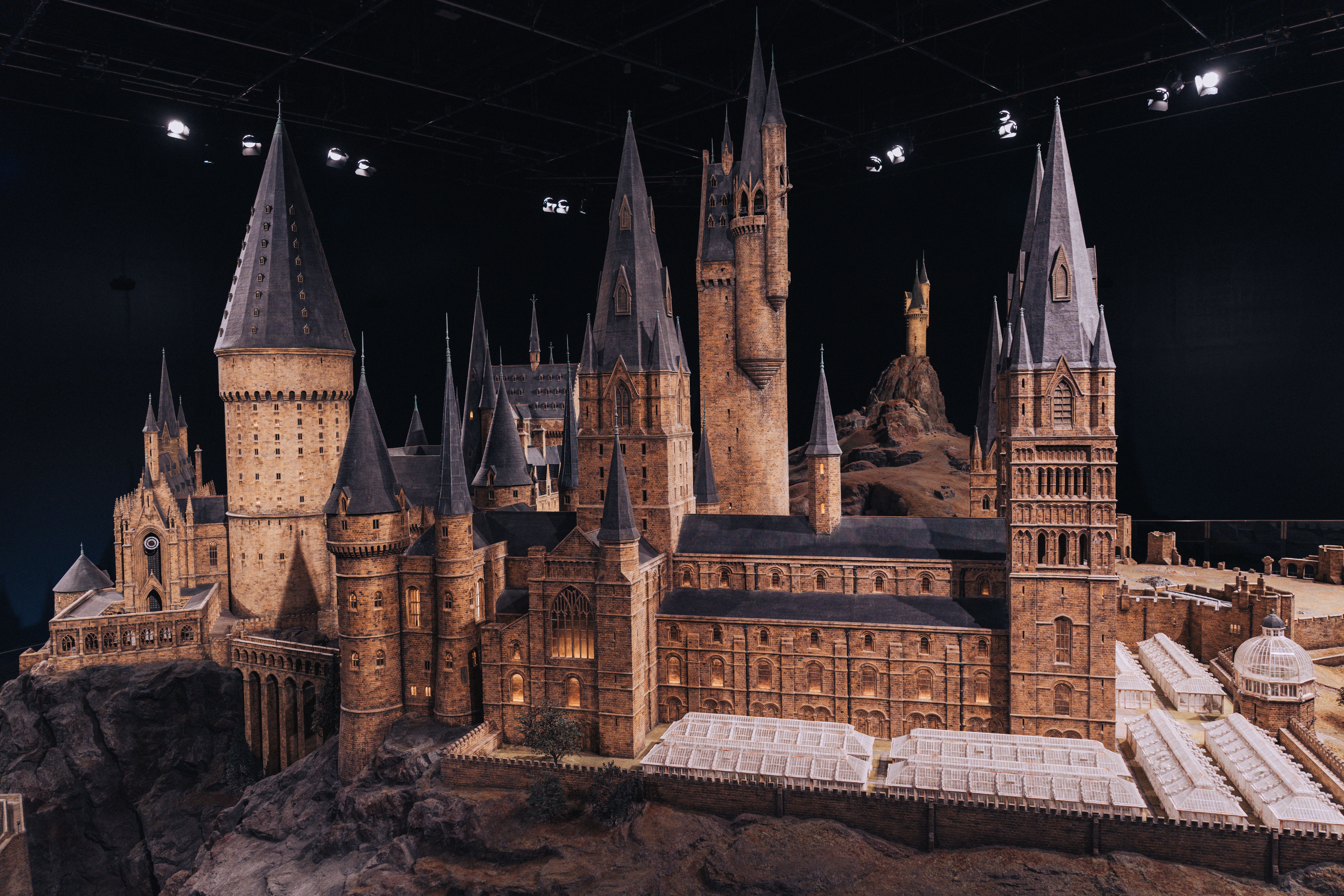 Detailed miniature model of a famous wizarding school castle, showcasing Gothic architecture.