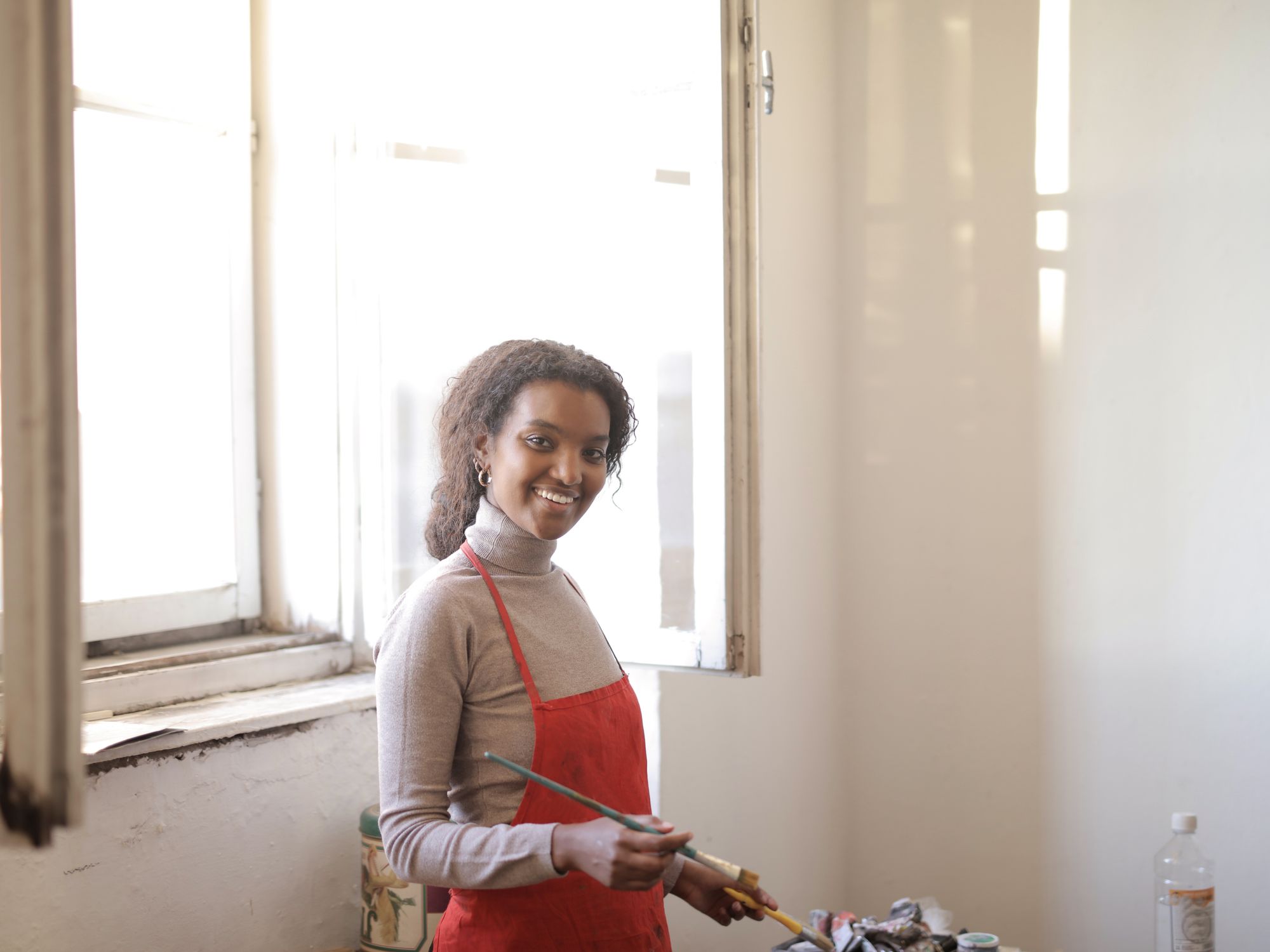 Interior Painting in Northumberland Park, Haringey — decorator applying interior paint to walls and ceilings