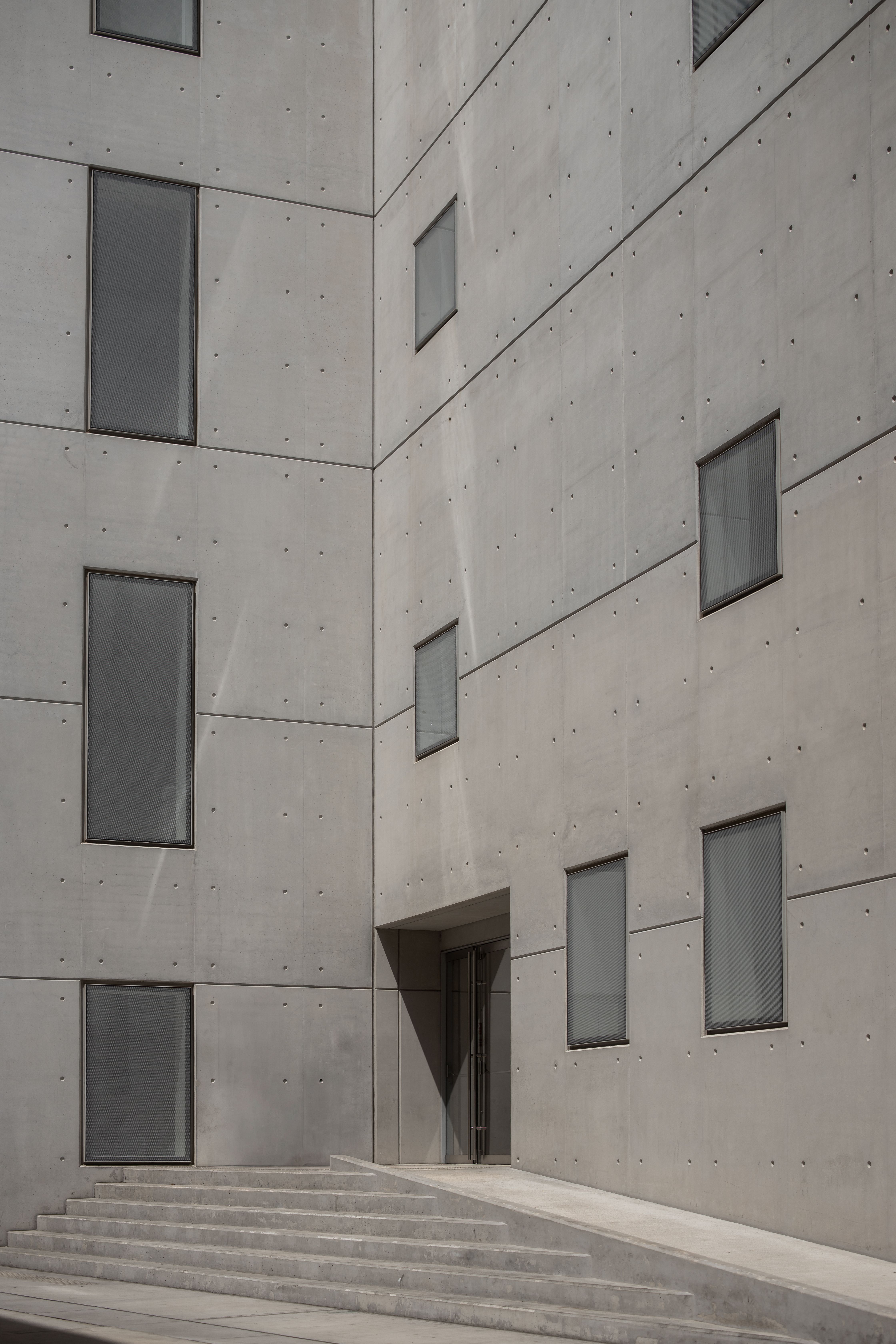 Minimalist Concrete Building Facade · Free Stock Photo