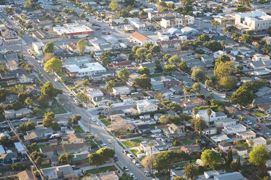 Overhead shot of a suburban neighborhood in Ventura, showcasing homes and streets.