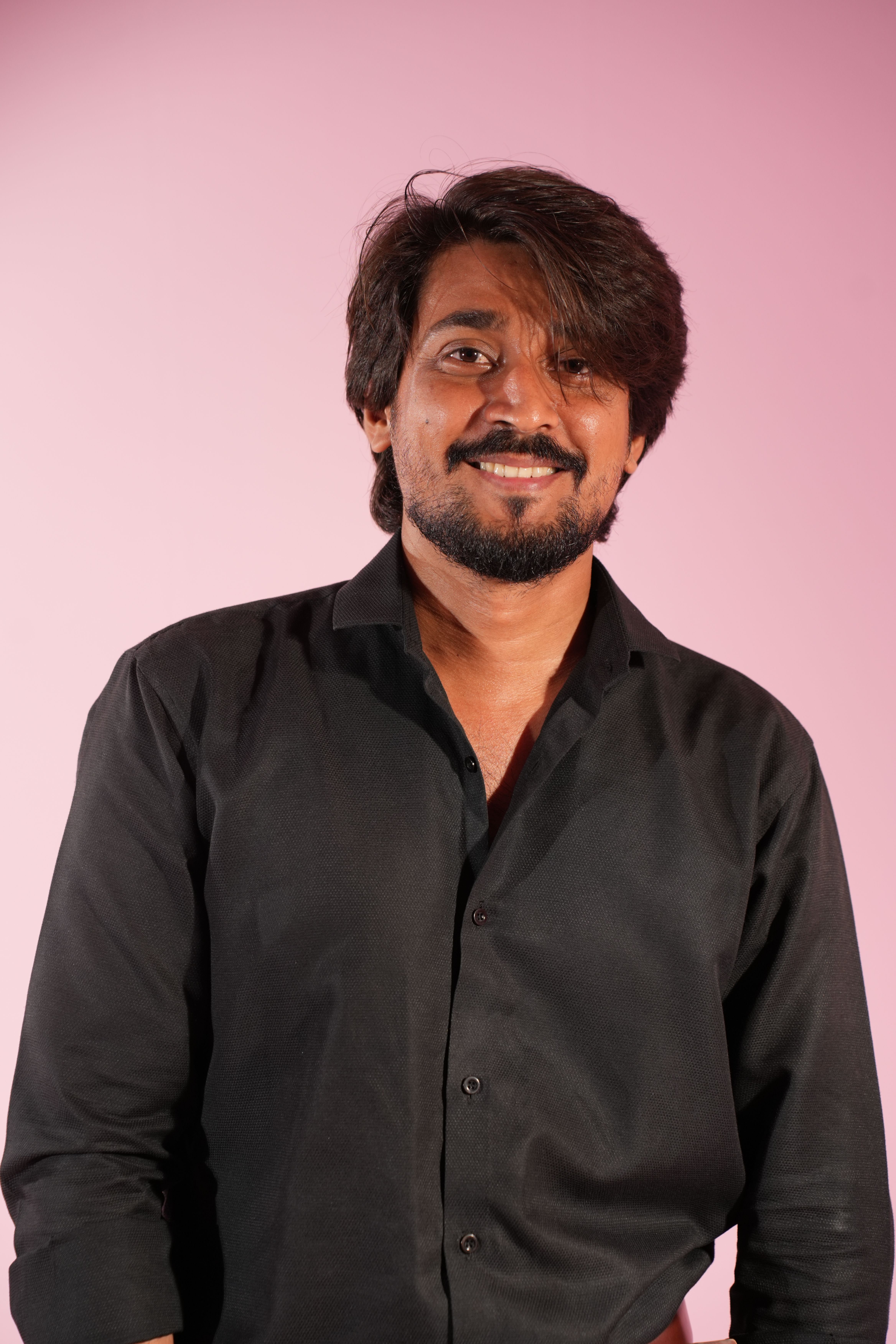 MoveKind founder portrait in a bright studio