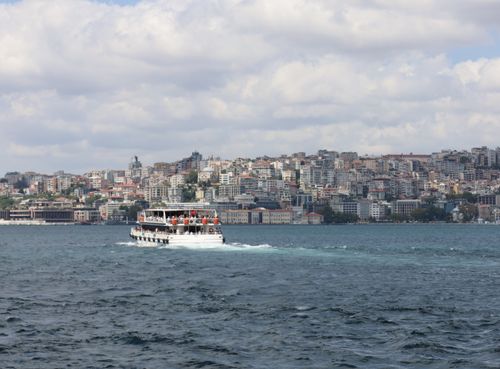 Free A scenic boat ride on the Bosphorus Strait with the city of Istanbul in the background. Stock Photo