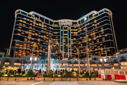 Free Stunning night view of Wynn Palace hotel and casino with illuminated facade in Macau. Stock Photo