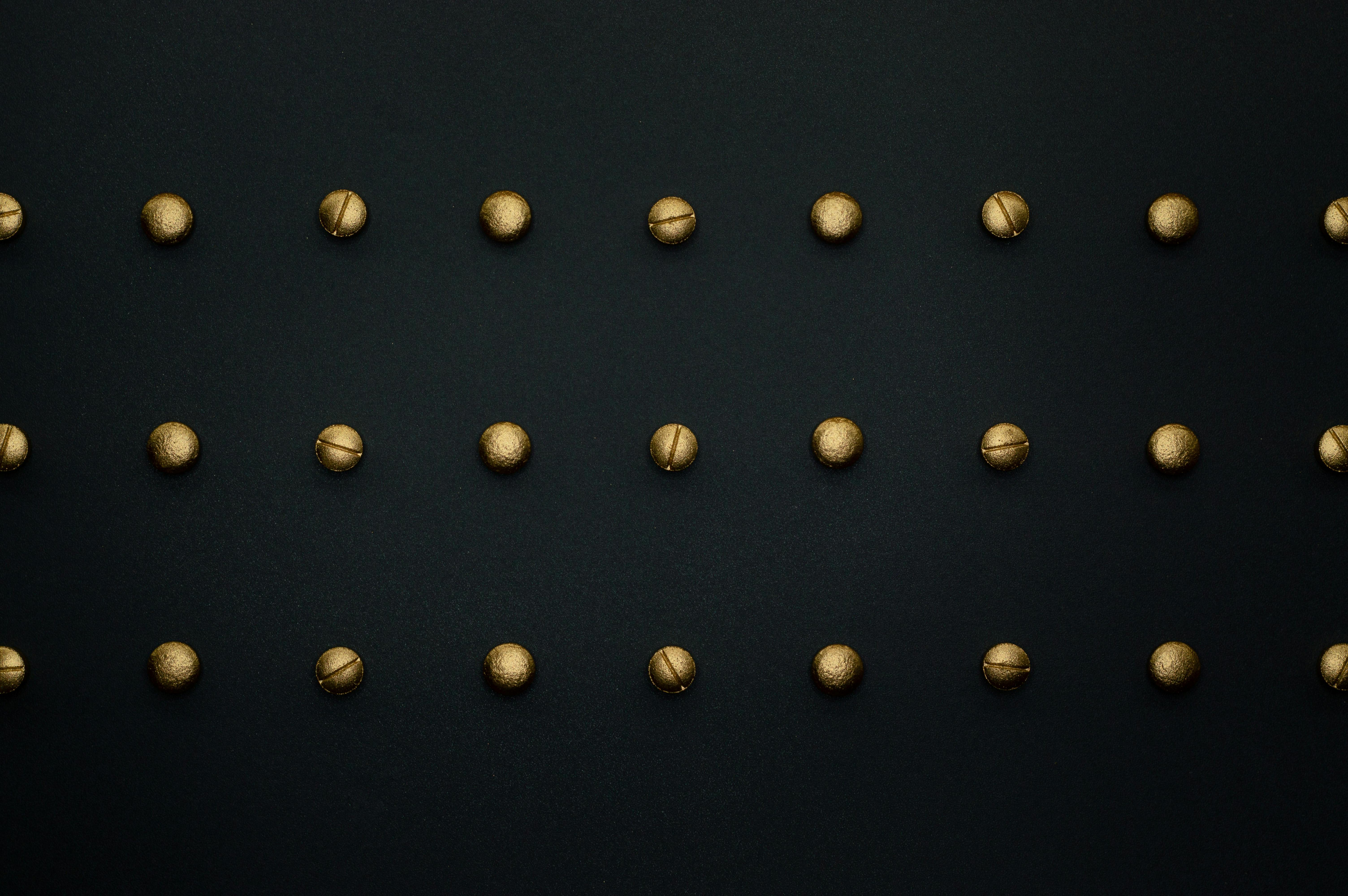 bronze tablets on black background