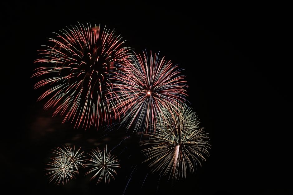 A stunning display of colorful fireworks illuminating the night sky.