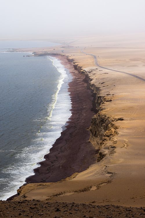 Free A breathtaking view of the dramatic cliffs and ocean coastline in Paracas National Reserve, Peru. Stock Photo