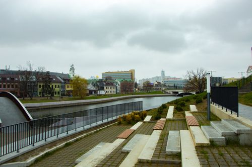 Free Explore the serene urban riverside and historic architecture in Minsk, Belarus. Stock Photo