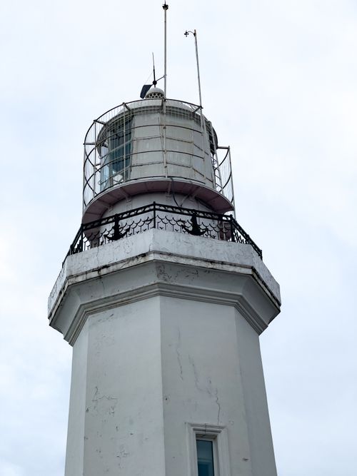 Free Close-up view of a historic lighthouse in Batumi, Georgia, against a cloudy sky. Stock Photo