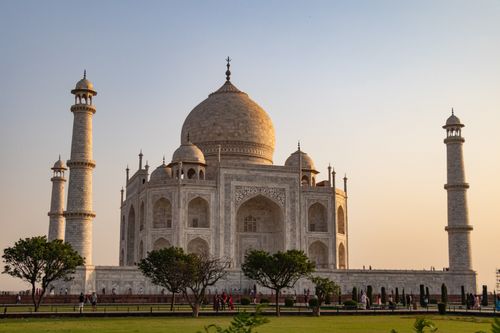 Free Beautiful view of the iconic Taj Mahal in Agra, India at sunset with clear skies. Stock Photo