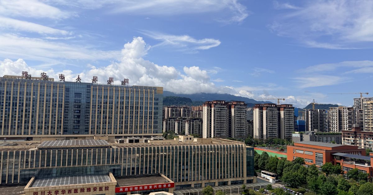 Panoramic view of a modern hospital campus and skyline