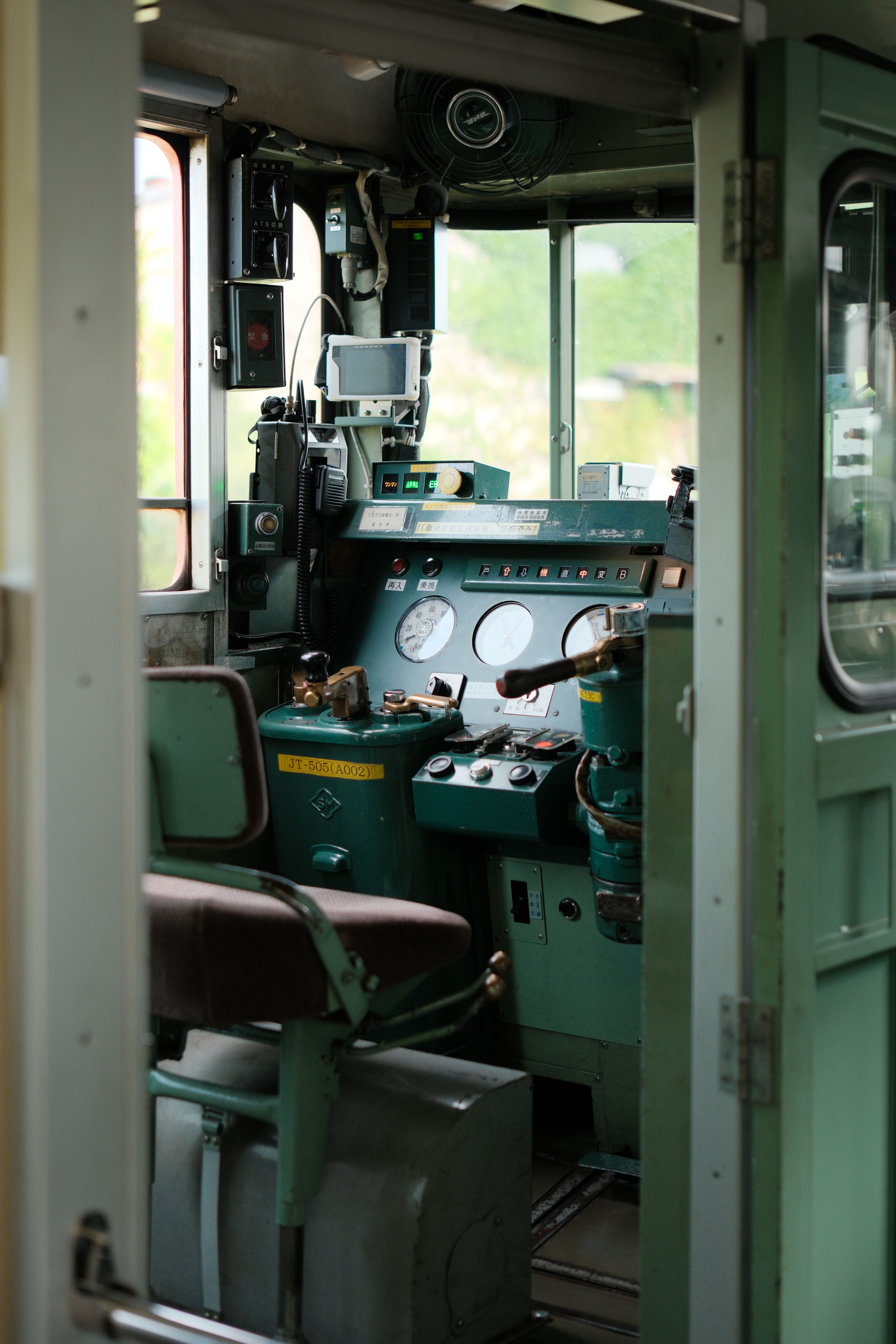 Explore the vintage controls and instruments inside a Japanese train cockpit.