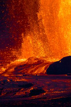 Stunning view of erupting lava at Hawaii Volcanoes National Park showcasing vibrant molten rock.