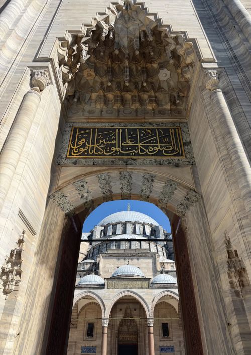 Free A stunning view of the grand entrance at Süleymaniye Mosque, Istanbul. Stock Photo