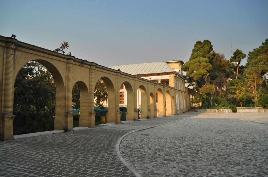 Explore the historic architecture of Masoudieh Mansion in Tehran with its stunning arches.