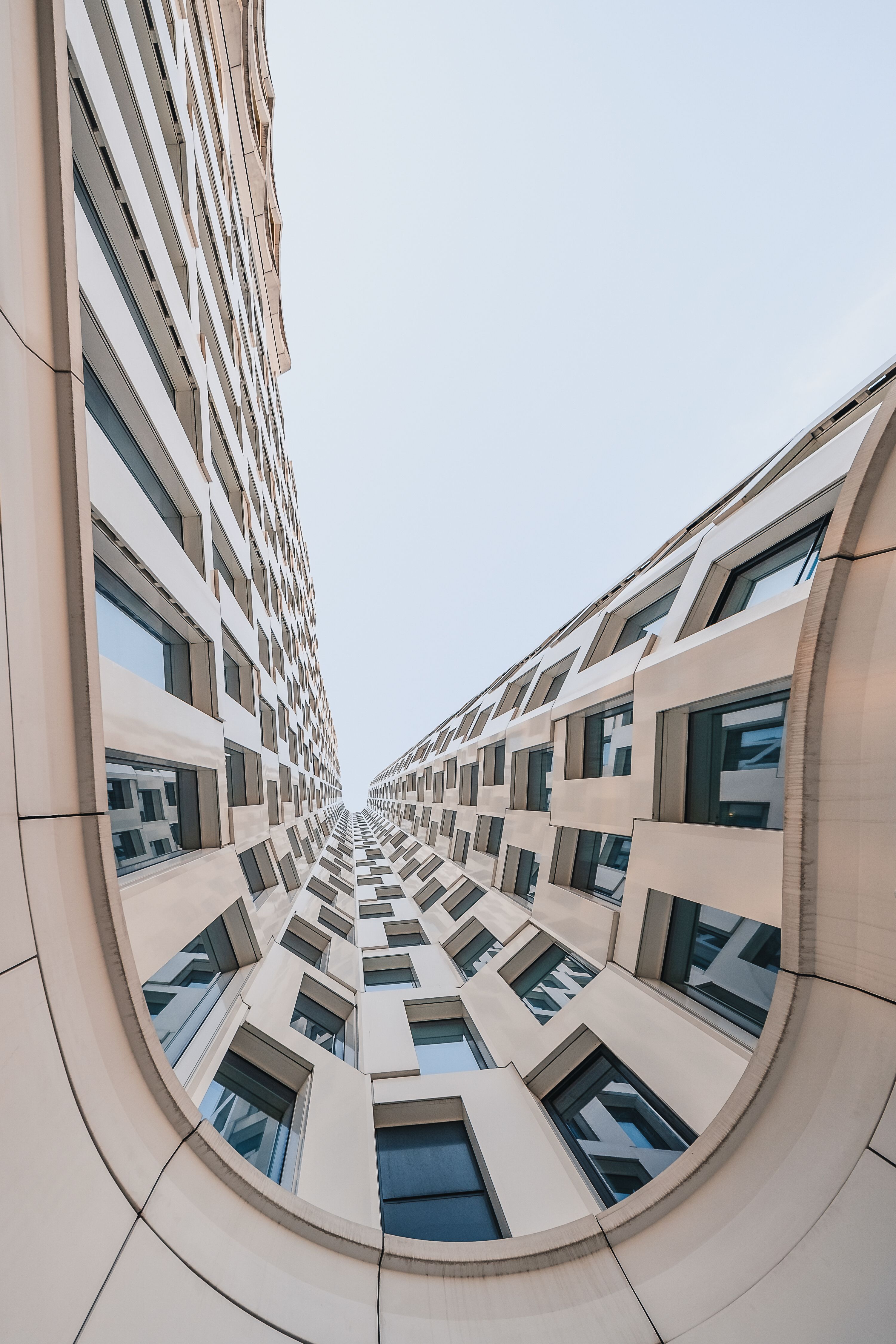 Dynamic view of a modern architectural building facade in Berlin, Germany.