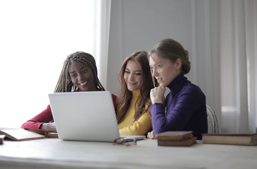 Women Looking At A Laptop