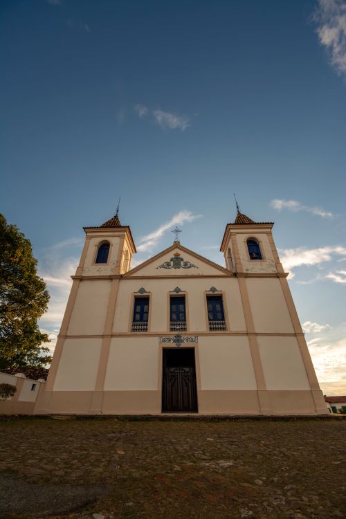 Free Historic colonial church facade in Santa Luzia, Minas Gerais, Brazil at sunset. Stock Photo