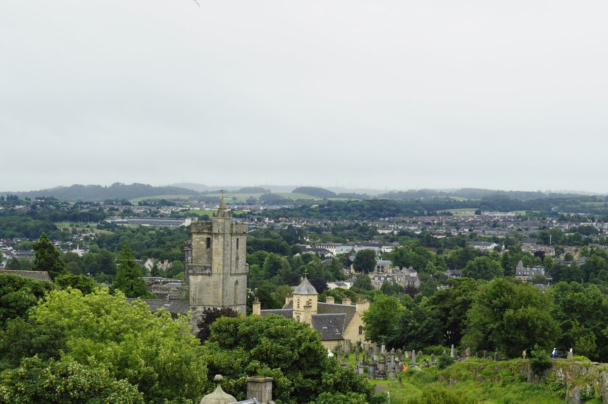 Stirling rooftops and church tower from the castle hill, an area we cover for solar and batteries