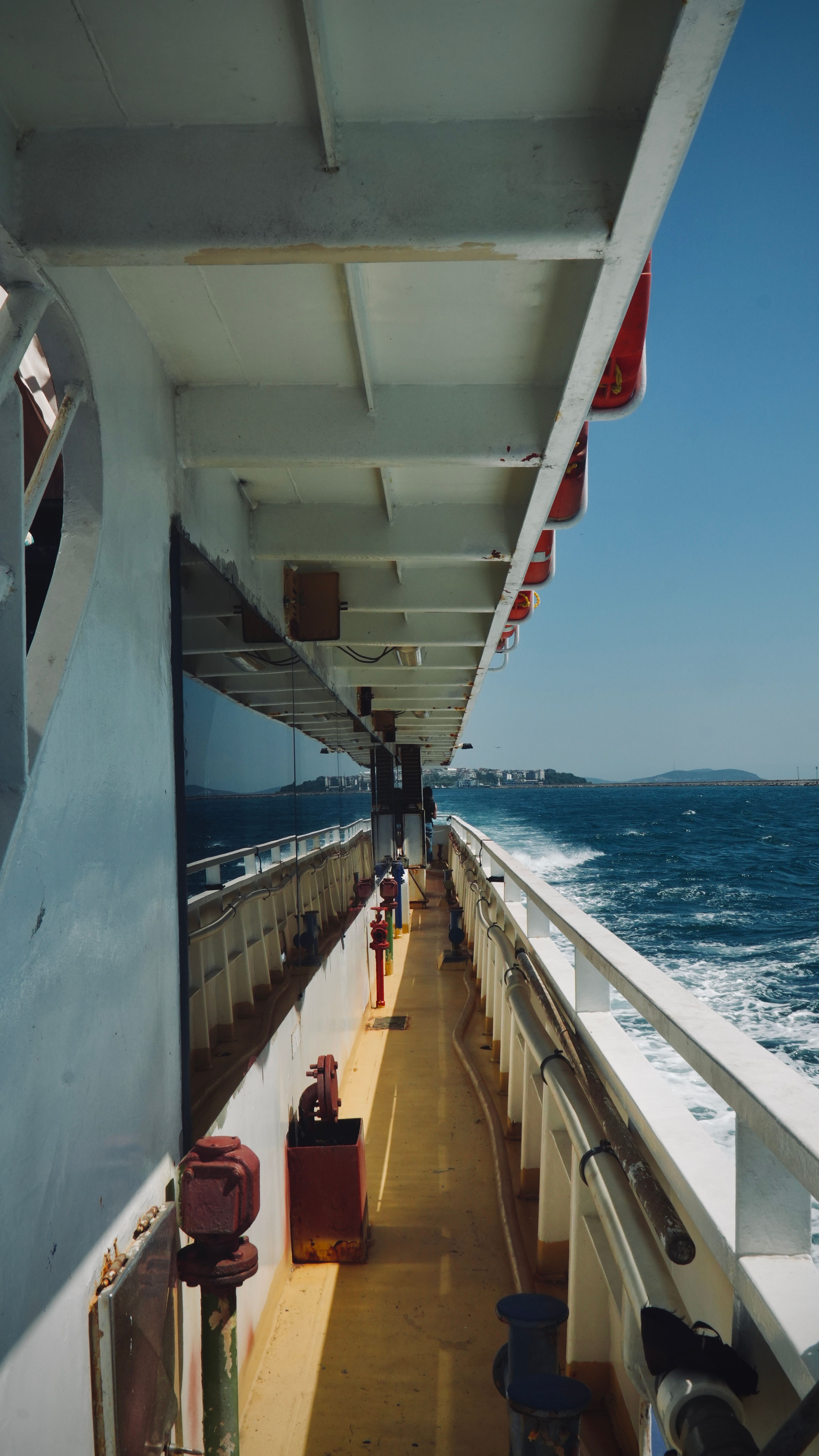 A stunning view from a ship deck sailing in Istanbul with picturesque blue ocean waves.