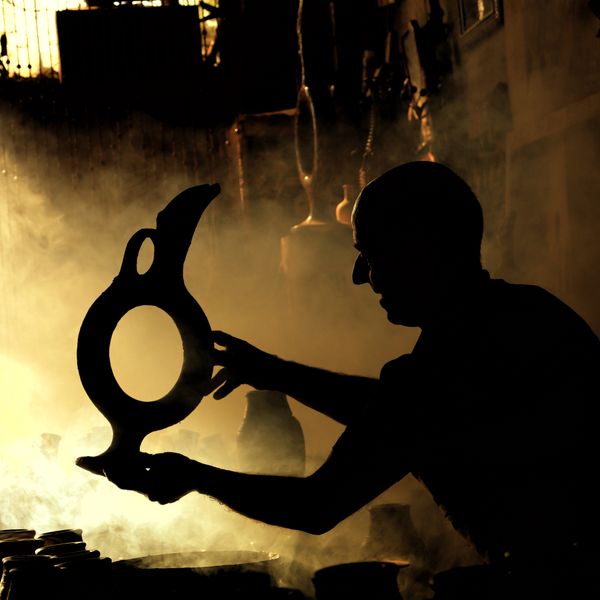 Potter at the kiln by Lila Limon on Pexels