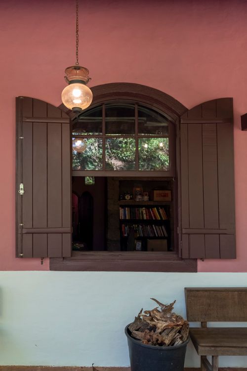 Free Charming rustic window with wooden shutters in a Brazilian home. Stock Photo