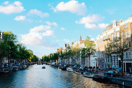 Základová fotografie zdarma na téma Amsterdam, architektura, břeh řeky