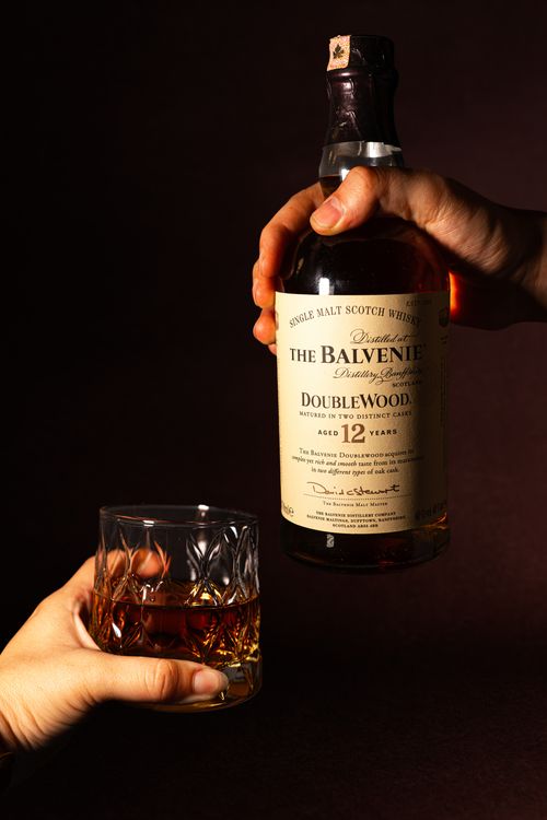 Free Close-up of The Balvenie DoubleWood 12-year-old whisky bottle and glass. Stock Photo