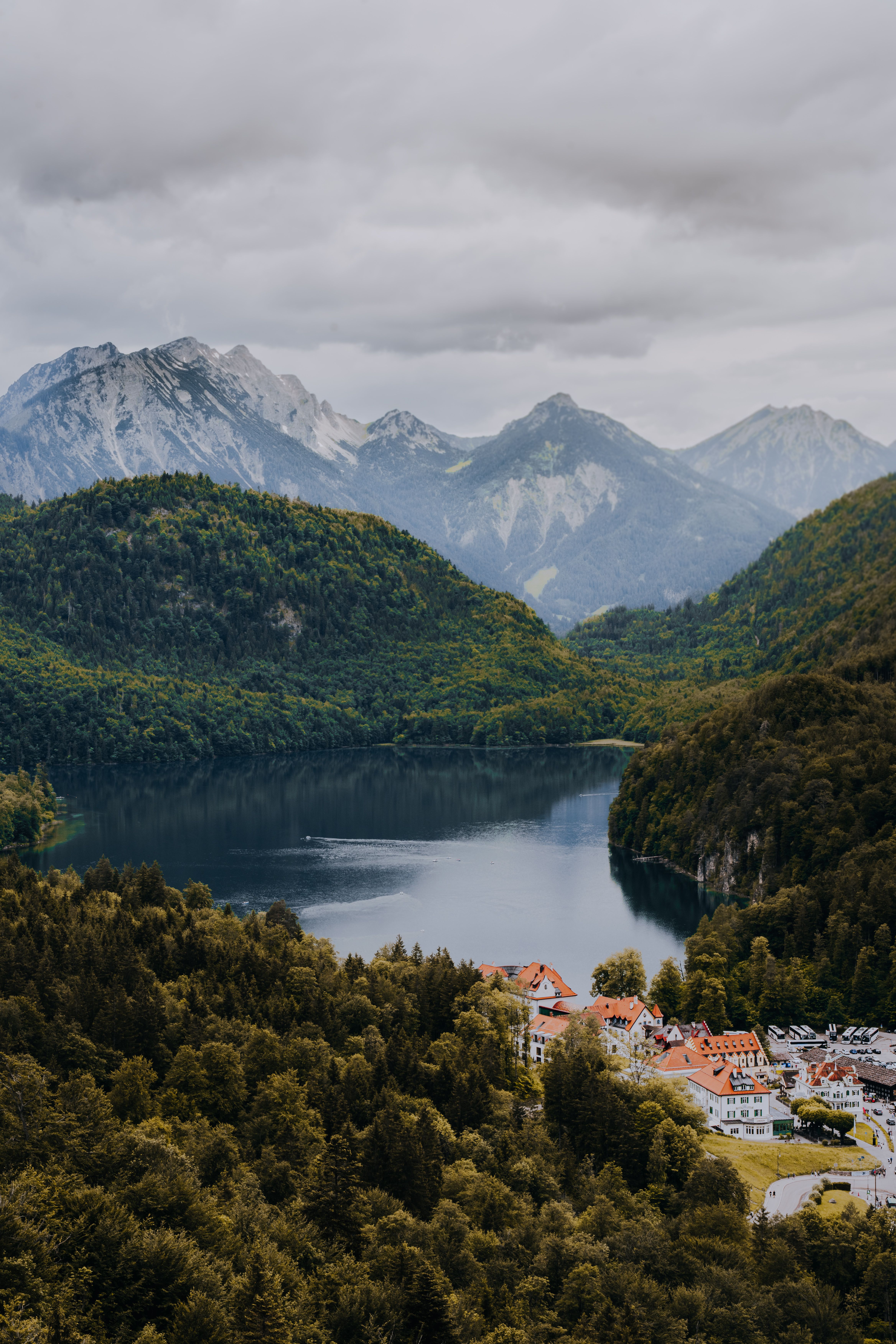 A breathtaking aerial view of Füssen with the Bavarian Alps and lake in the background.