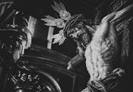 Grayscale Photo of a Statue