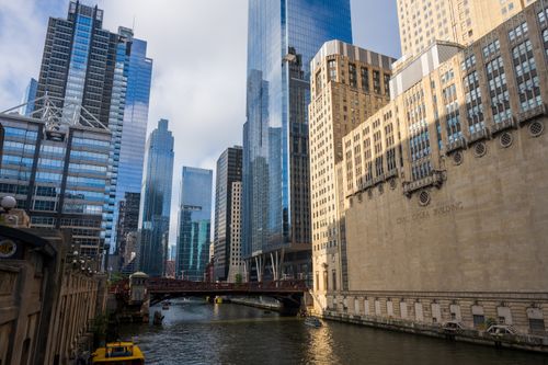 Free A vibrant view of Chicago's skyline featuring the iconic Civic Opera Building on a sunny day. Stock Photo