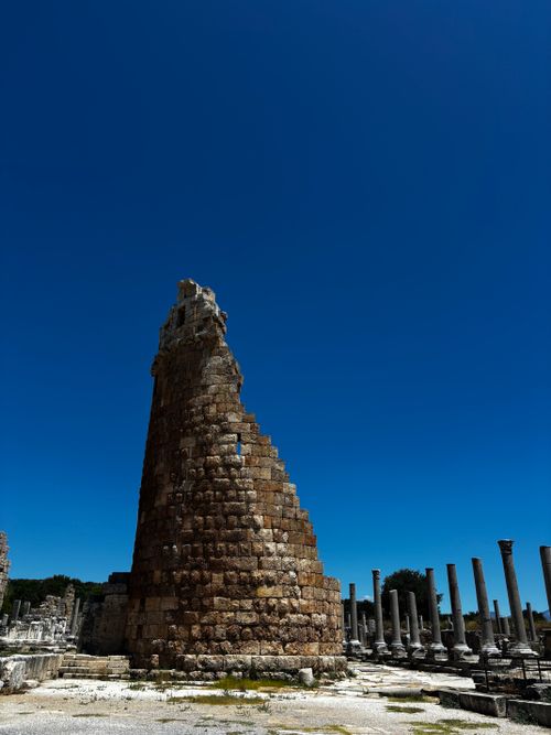 Free Explore the ancient tower ruins in Antalya, Türkiye, against a vivid blue sky, showcasing historical architecture. Stock Photo