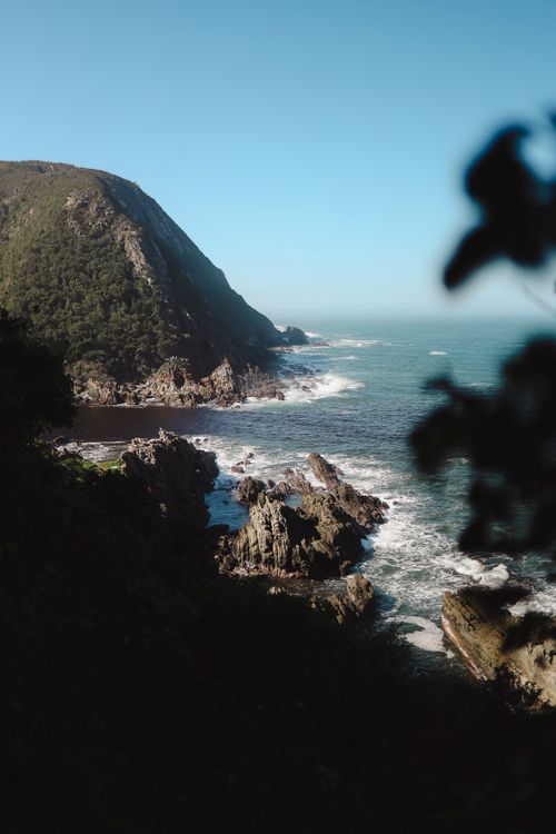 Free Stunning rocky coastline and ocean waves in Tsitsikamma, nature's beauty at its finest. Stock Photo