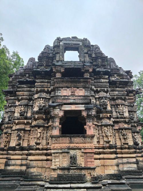 Free A detailed view of an ancient Hindu temple displaying exquisite stone carvings in Gujarat, India. Stock Photo