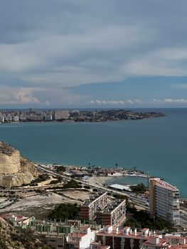 A stunning aerial view of Alicante's coastline showcasing its urban and natural beauty.