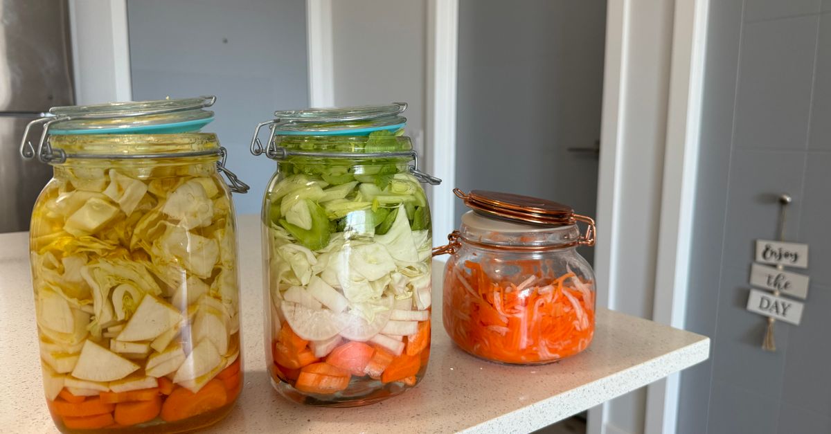 air fryer and glass meal prep containers on kitchen counter