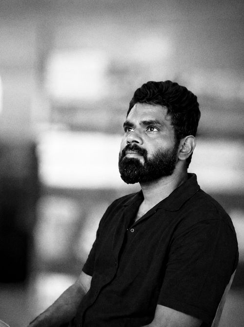 Free Black and white portrait of a thoughtful man with a beard, indoors, Coimbatore, India. Stock Photo