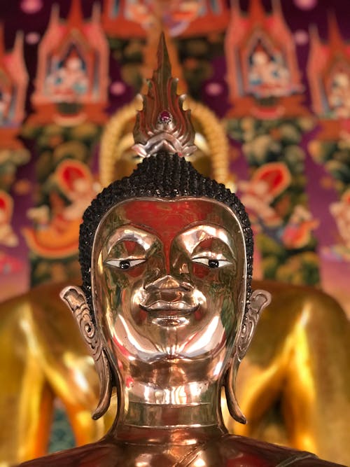 Ancient Buddhist shrine with Buddha sculptures