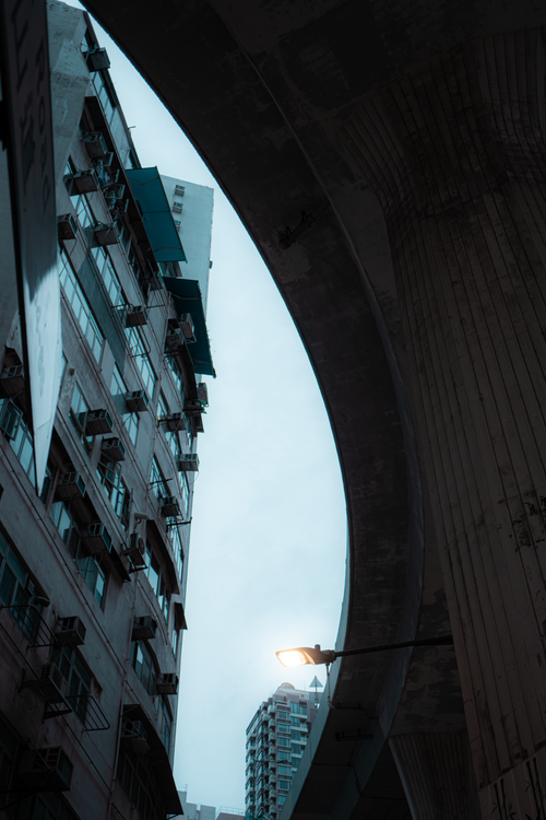 Free Moody view of urban structures and elevated bridge on Hong Kong Island. Stock Photo
