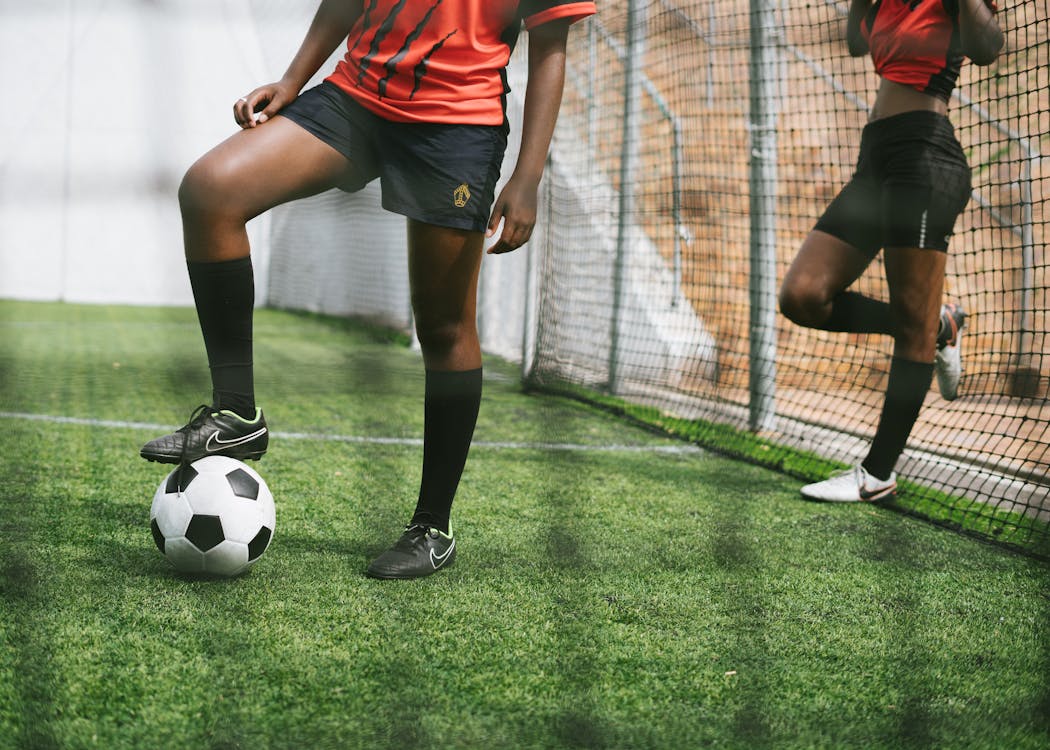 Free Anonymous women soccer players in training Stock Photo