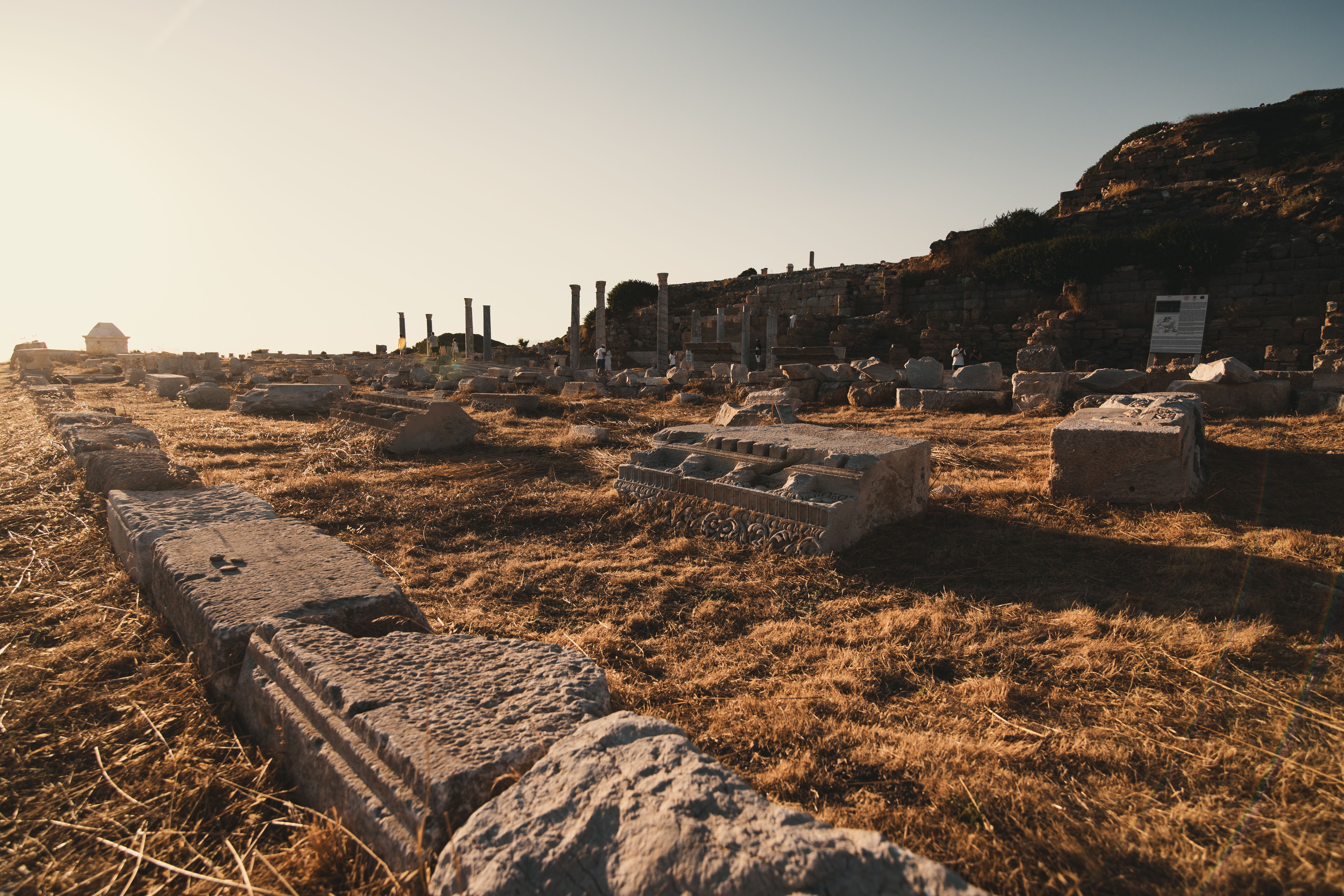 Explore the sunlit ancient ruins at an archaeological site, offering a glimpse into past civilizations.