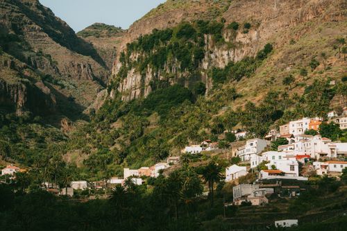 Free Scenic view of Valle Gran Rey village nestled among lush cliffs of La Gomera, Canary Islands. Stock Photo