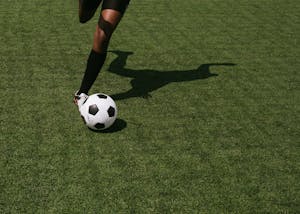 Anonymous soccer player on field during match